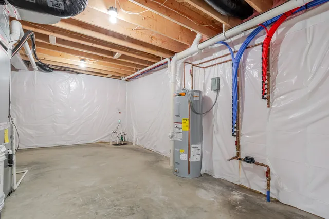 a view of empty room with wooden walls