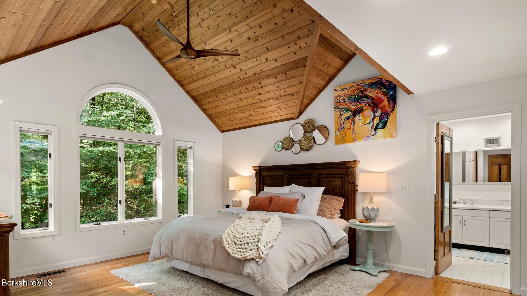 499 Norton Road Otis, MA 01029 - Photo 11 of 31 a bedroom with a bed and a window