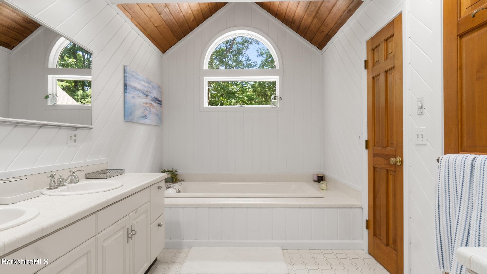 499 Norton Road Otis, MA 01029 - Photo 12 of 31 a bathroom with a bathtub and a sink