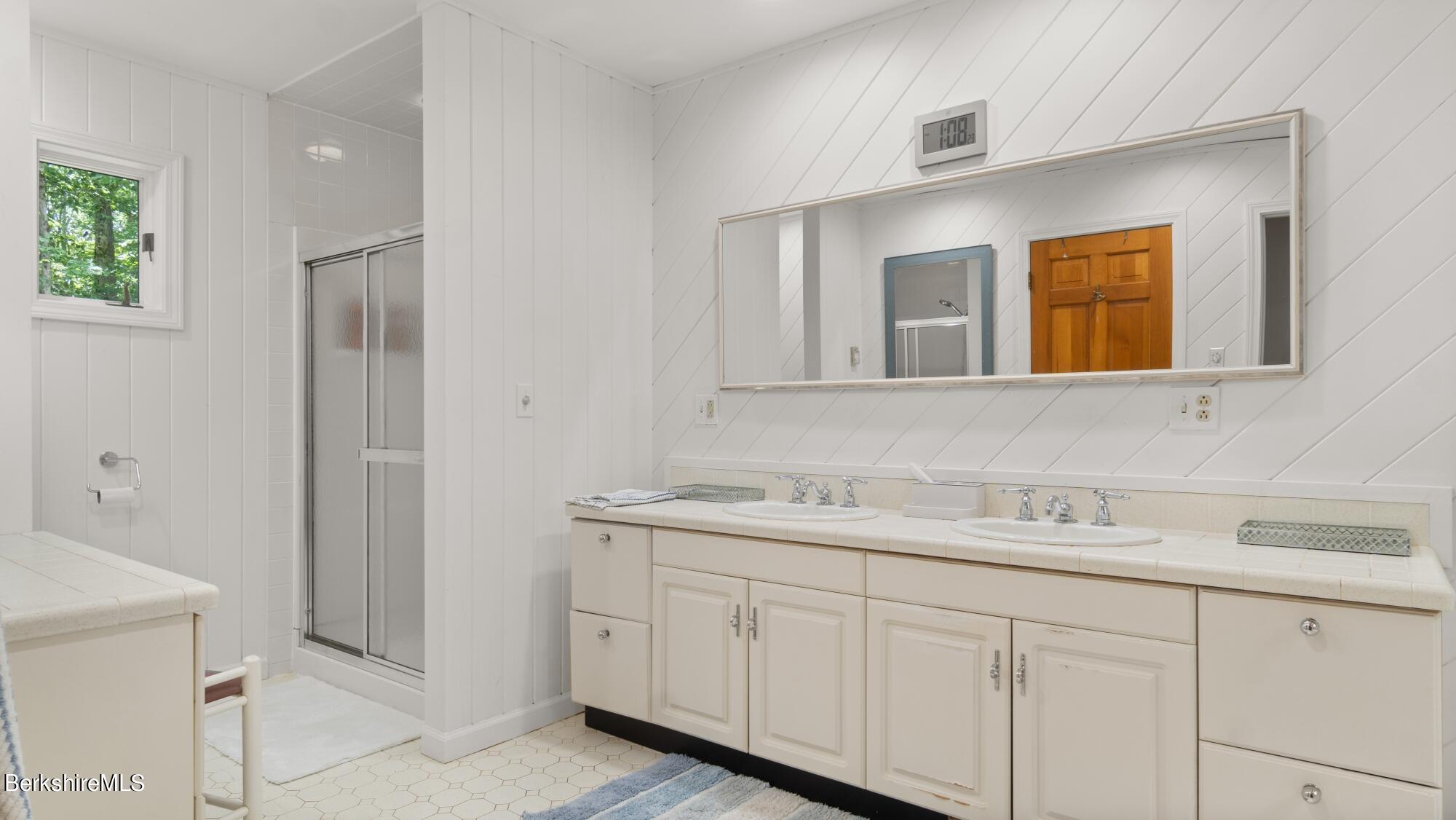 499 Norton Road Otis, MA 01029 - Photo 13 of 31 a bathroom with a sink and a mirror