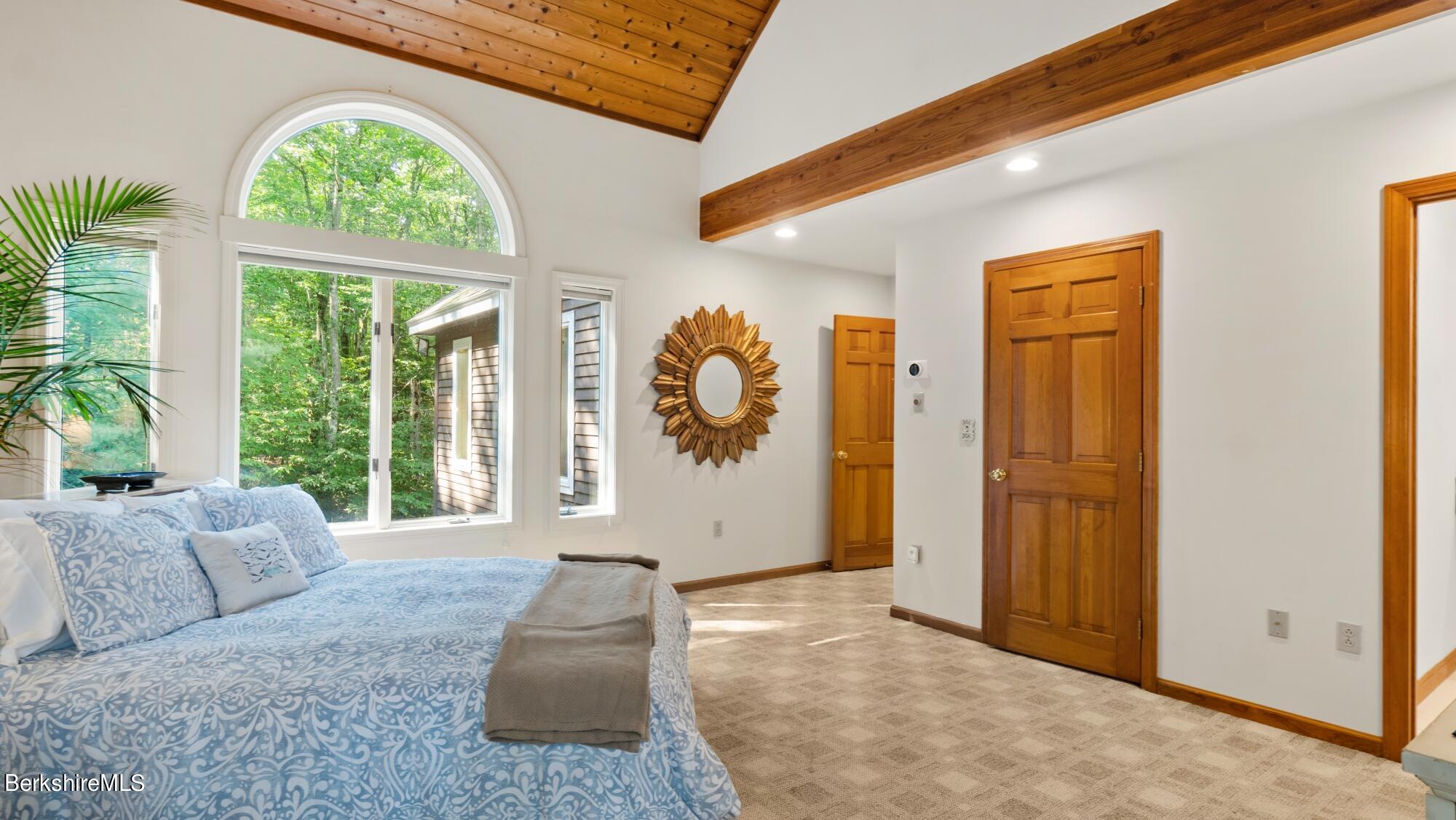 499 Norton Road Otis, MA 01029 - Photo 17 of 31 a living room with furniture and a large window