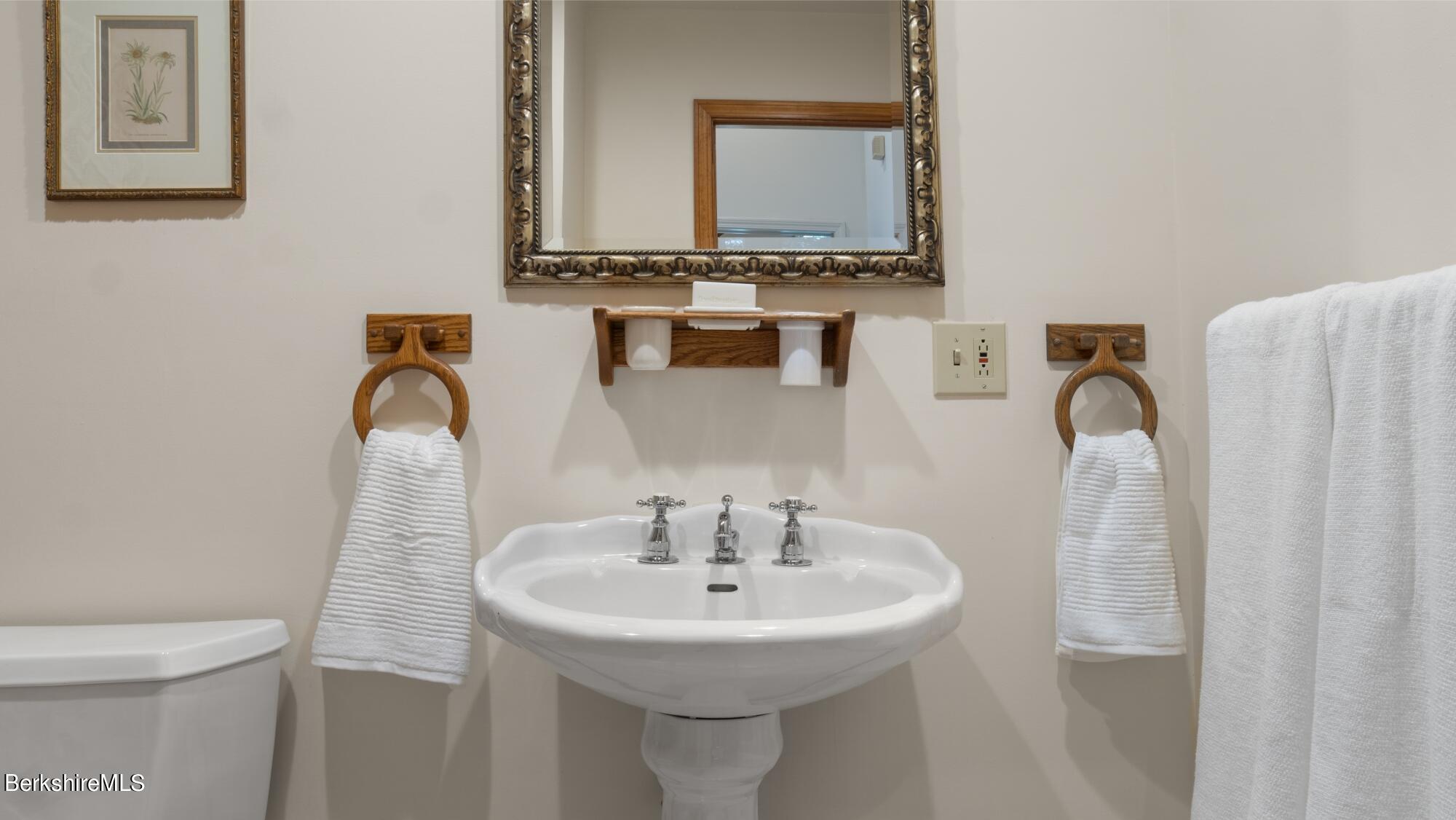 499 Norton Road Otis, MA 01029 - Photo 21 of 31 a bathroom with a sink and a mirror