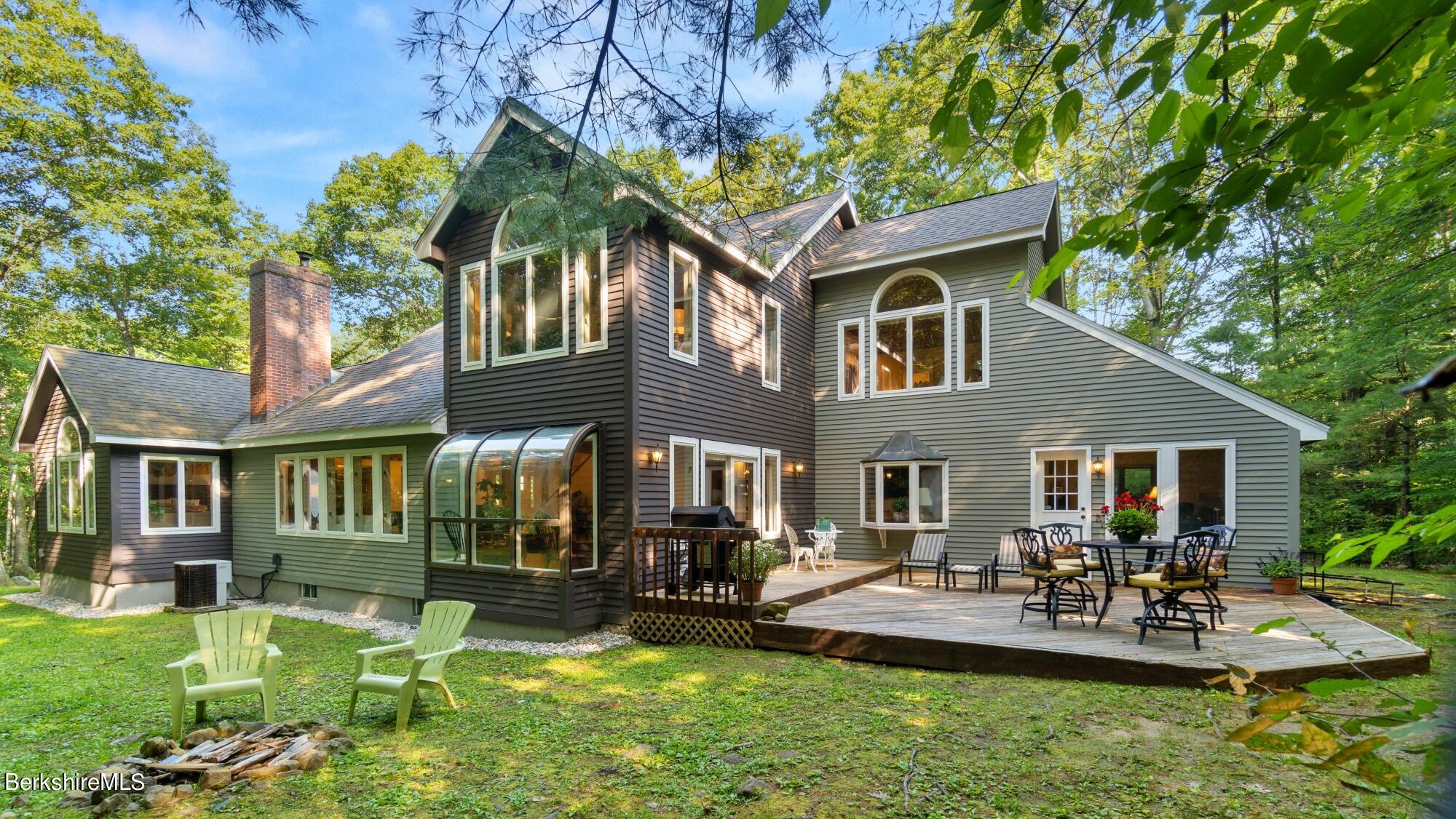 499 Norton Road Otis, MA 01029 - Photo 3 of 31 a view of a house with swimming pool and sitting area