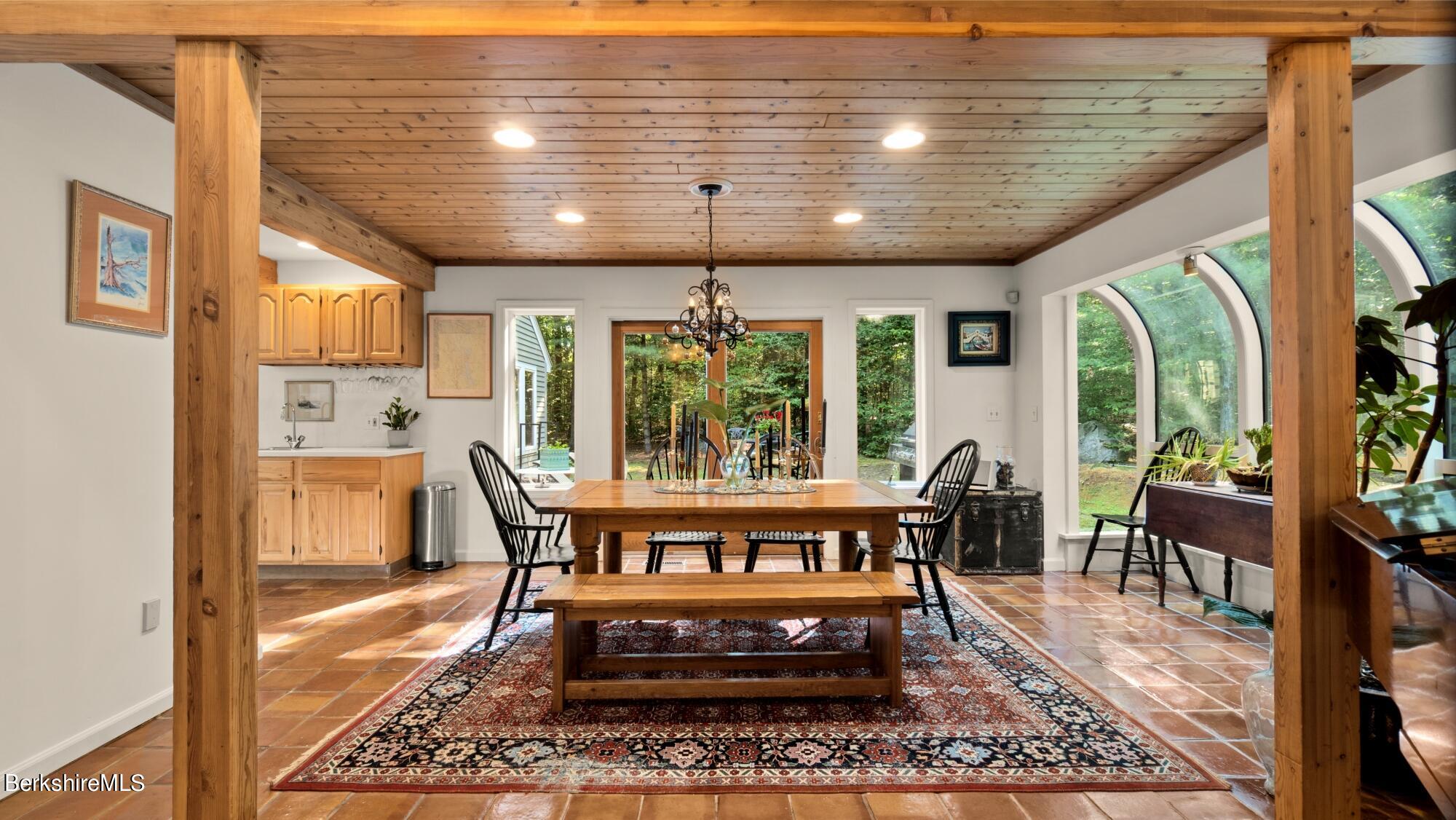 499 Norton Road Otis, MA 01029 - Photo 5 of 31 a view of a dining room with furniture window and outside view
