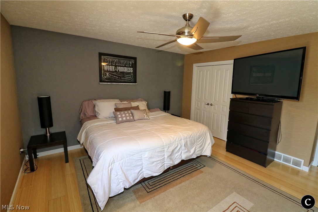 848 Lander Road Cleveland, OH 44143 - Photo 14 of 30 MASTER SUITE WITH BAMBOO FLOORS & OVERSIZED CLOSET SPACE