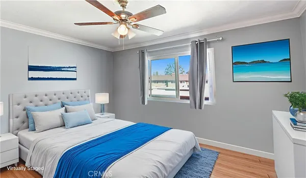 a bedroom with bed and a window
