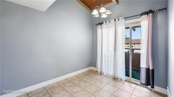 a view of a bathroom with a shower and a mirror