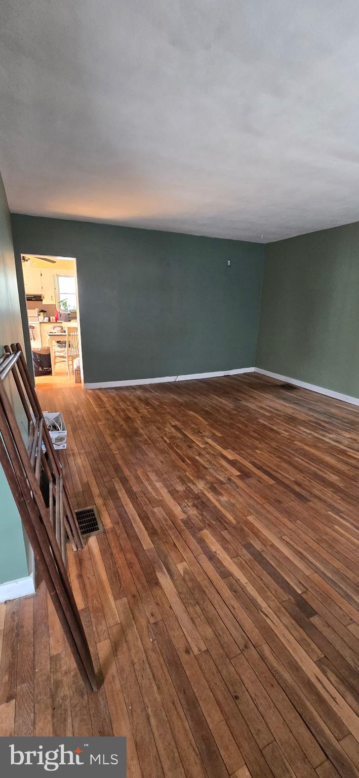 1272 Boiling Springs Road Mechanicsburg, PA 17055 - Photo 6 of 16 a view of a room with wooden floor