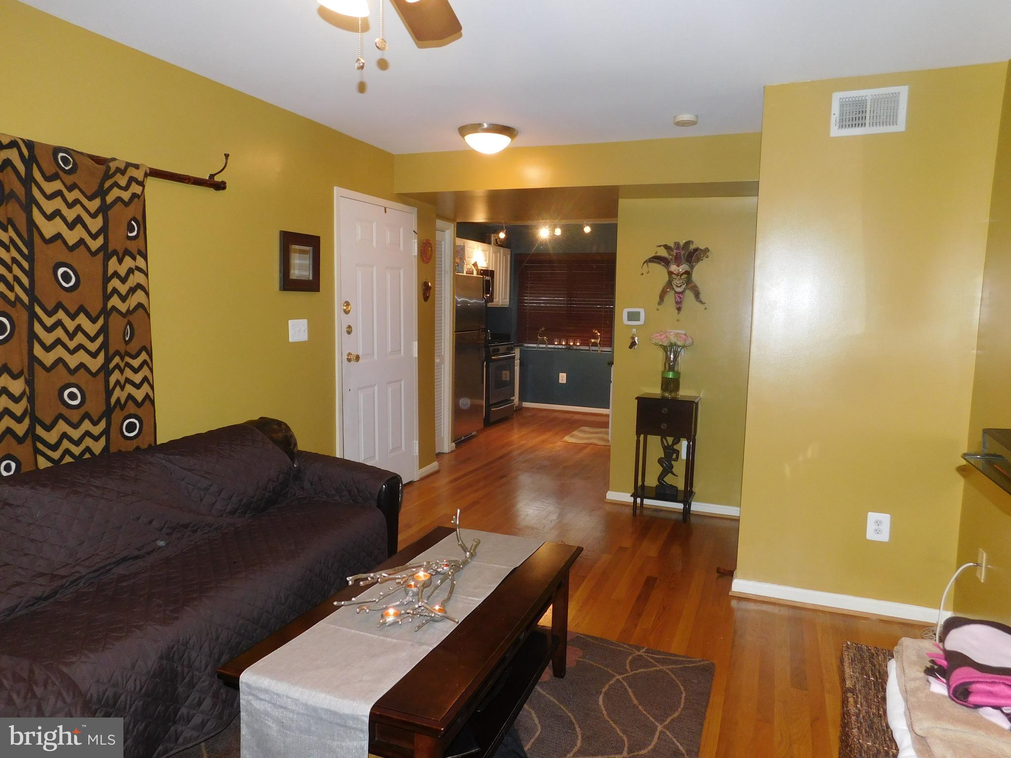 4212 Benning Road Northeast, Unit 4 Washington, DC 20019 - Photo 1 of 14 Living Room/Kitchen View