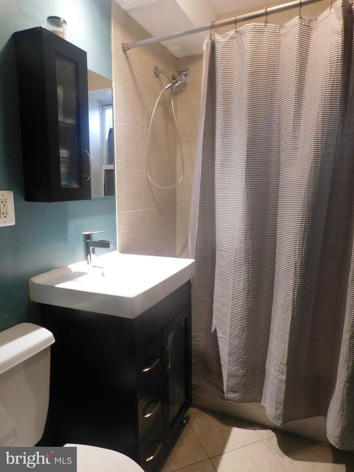 4212 Benning Road Northeast, Unit 4 Washington, DC 20019 - Photo 12 of 14 Bathroom