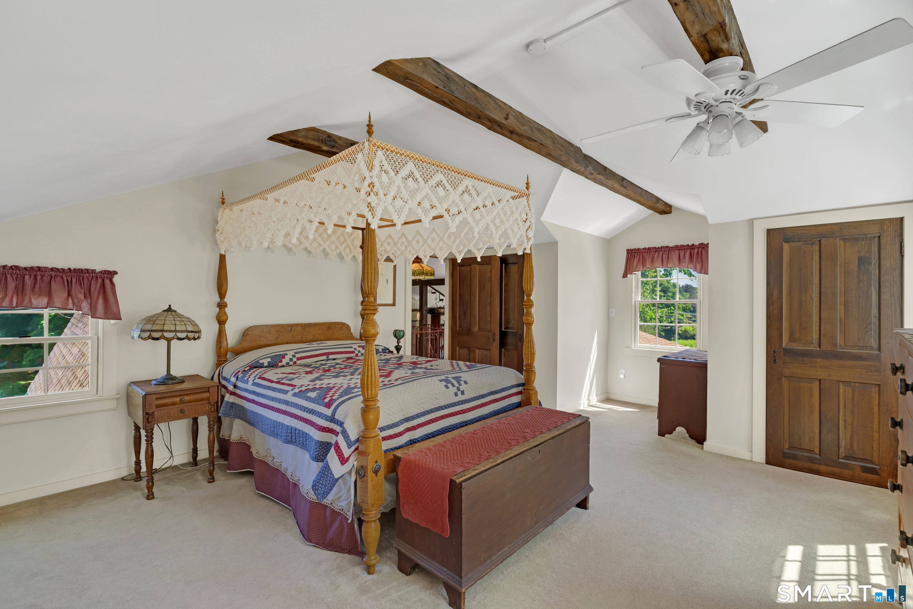 369 Saybrook Road Haddam, CT 06441 - Photo 17 of 29 The primary bedroom overlooks the backyard, offering space and privacy.