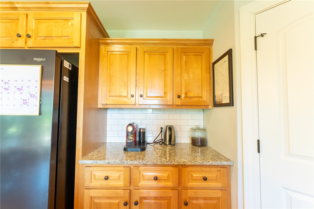 696 Mt Olivet Road Six Mile, SC 29682 - Photo 8 of 35 This charming kitchen nook offers both functionality and style with its attractive cabinetry and sleek countertop.