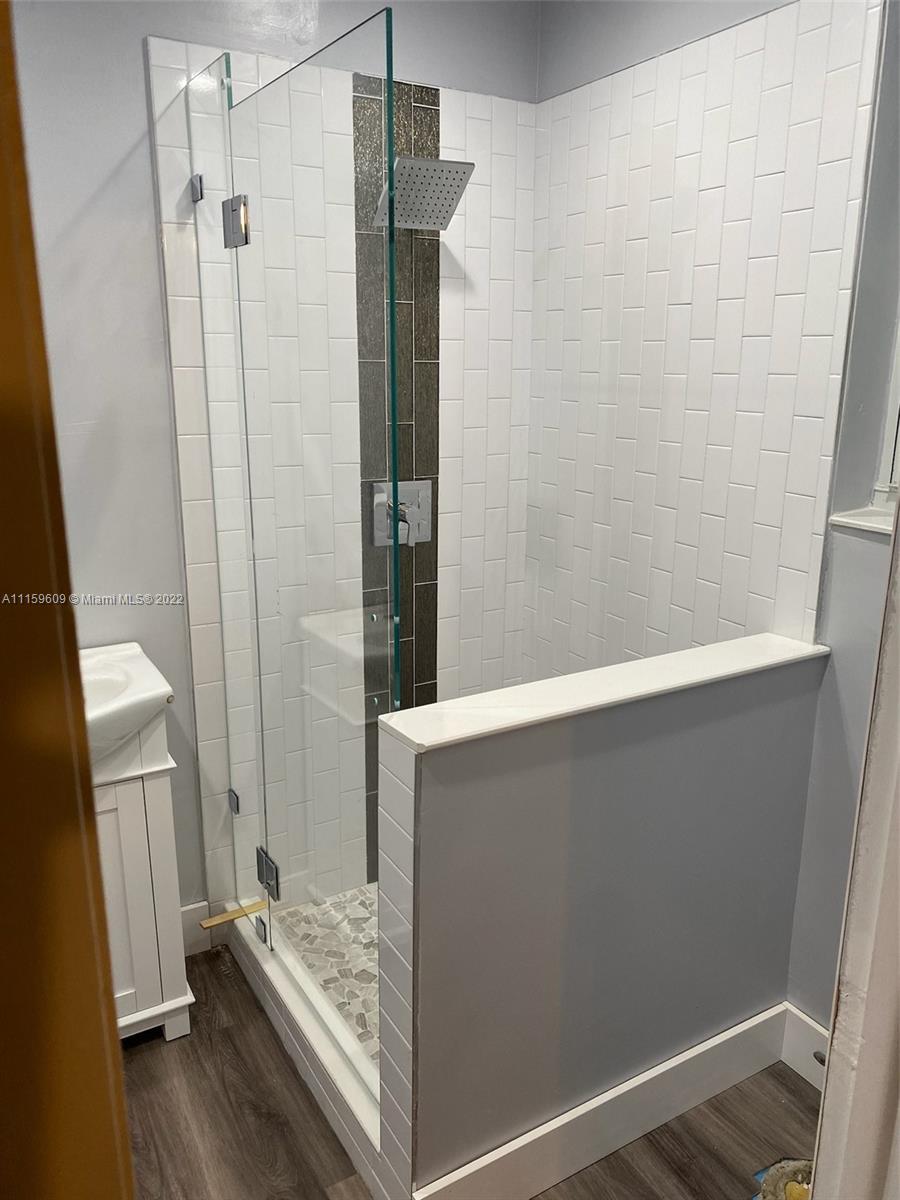 326 Southeast 3rd Terrace Dania Beach, FL 33004 - Photo 13 of 29 a view of bathroom with a shower and a tub
