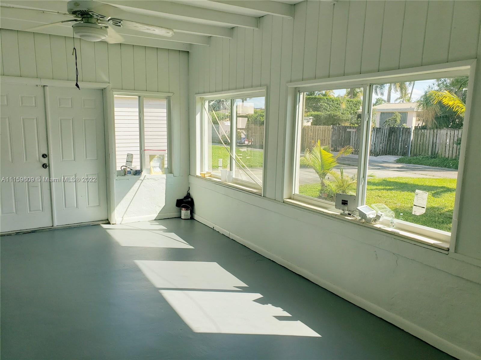 326 Southeast 3rd Terrace Dania Beach, FL 33004 - Photo 21 of 29 a view of an empty room with a window