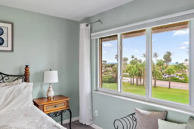 a room with furniture and a window