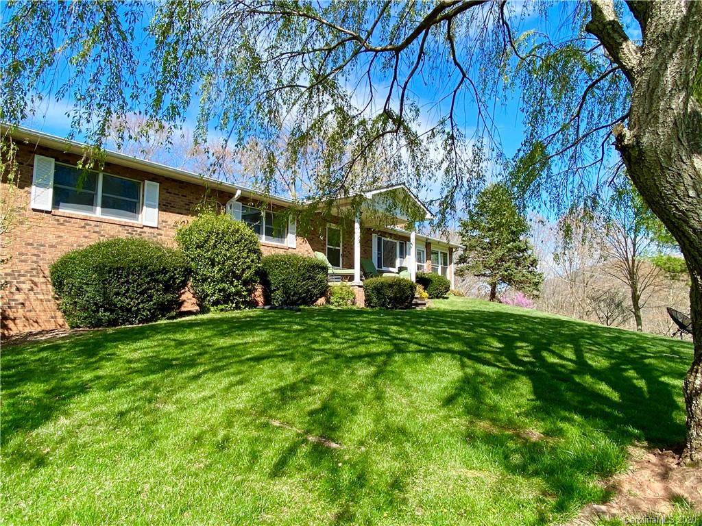 27 Morgan Branch Road Leicester, NC 28748 - Photo 2 of 39 a view of a house with a yard