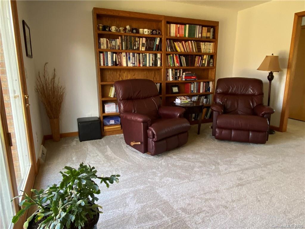 27 Morgan Branch Road Leicester, NC 28748 - Photo 11 of 39 a living room with furniture and a potted plant