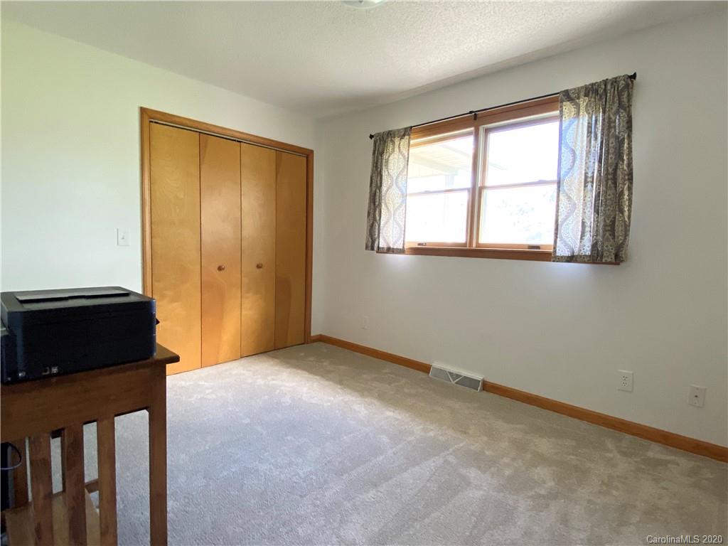 27 Morgan Branch Road Leicester, NC 28748 - Photo 25 of 39 a view of an empty room with a window