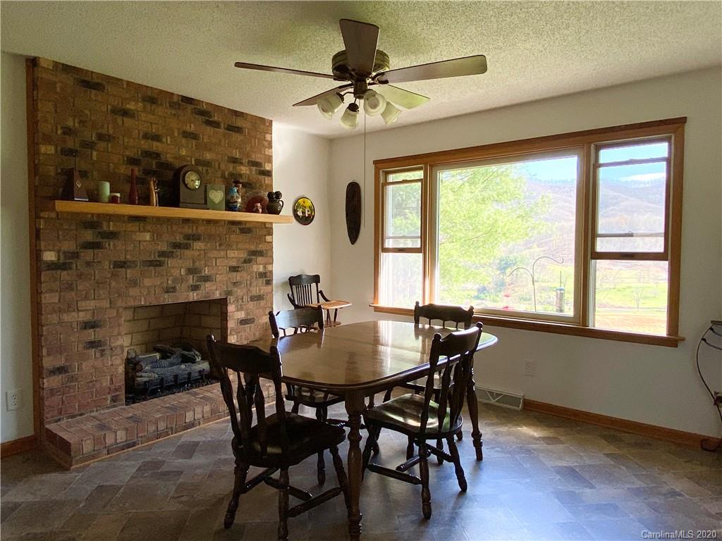27 Morgan Branch Road Leicester, NC 28748 - Photo 8 of 39 a dining room with furniture and window