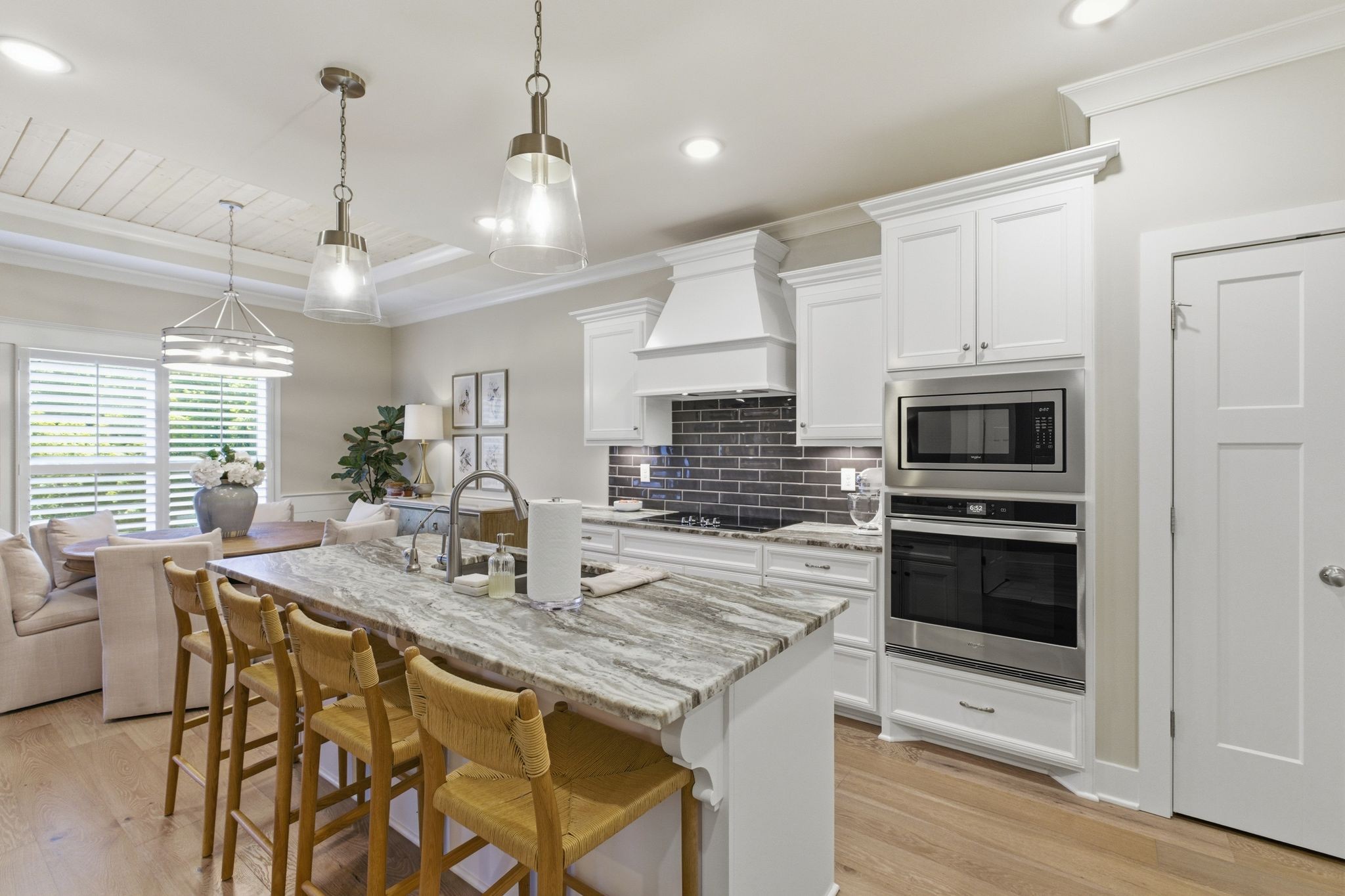 17845 Highway 76 East Springfield, TN 37172 - Photo 21 of 55 a kitchen with stainless steel appliances kitchen island granite countertop a stove a sink and a microwave