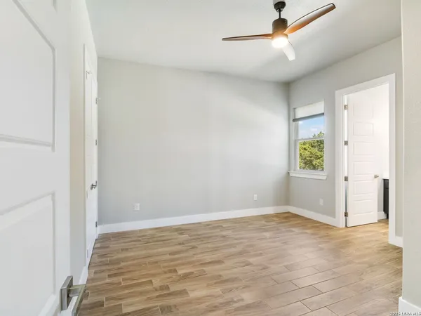 a view of a hallway with a white walls