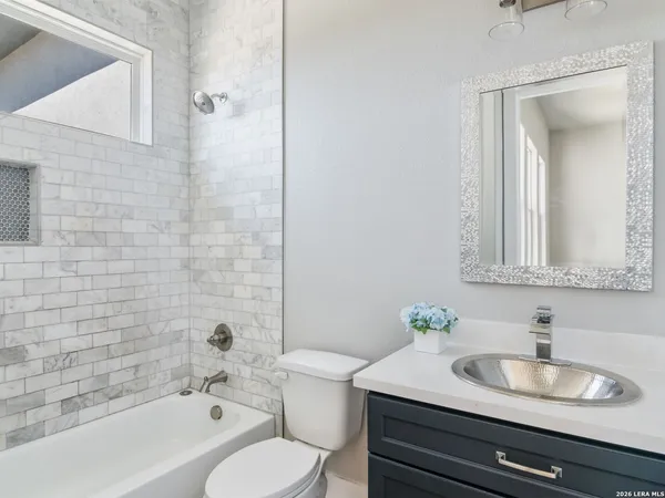 a view of a city with mountain