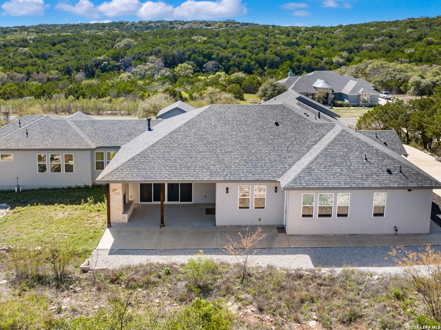 250 Private Road 2775 Mico, TX 78056 - Photo 48 of 57 a front view of a house with a yard