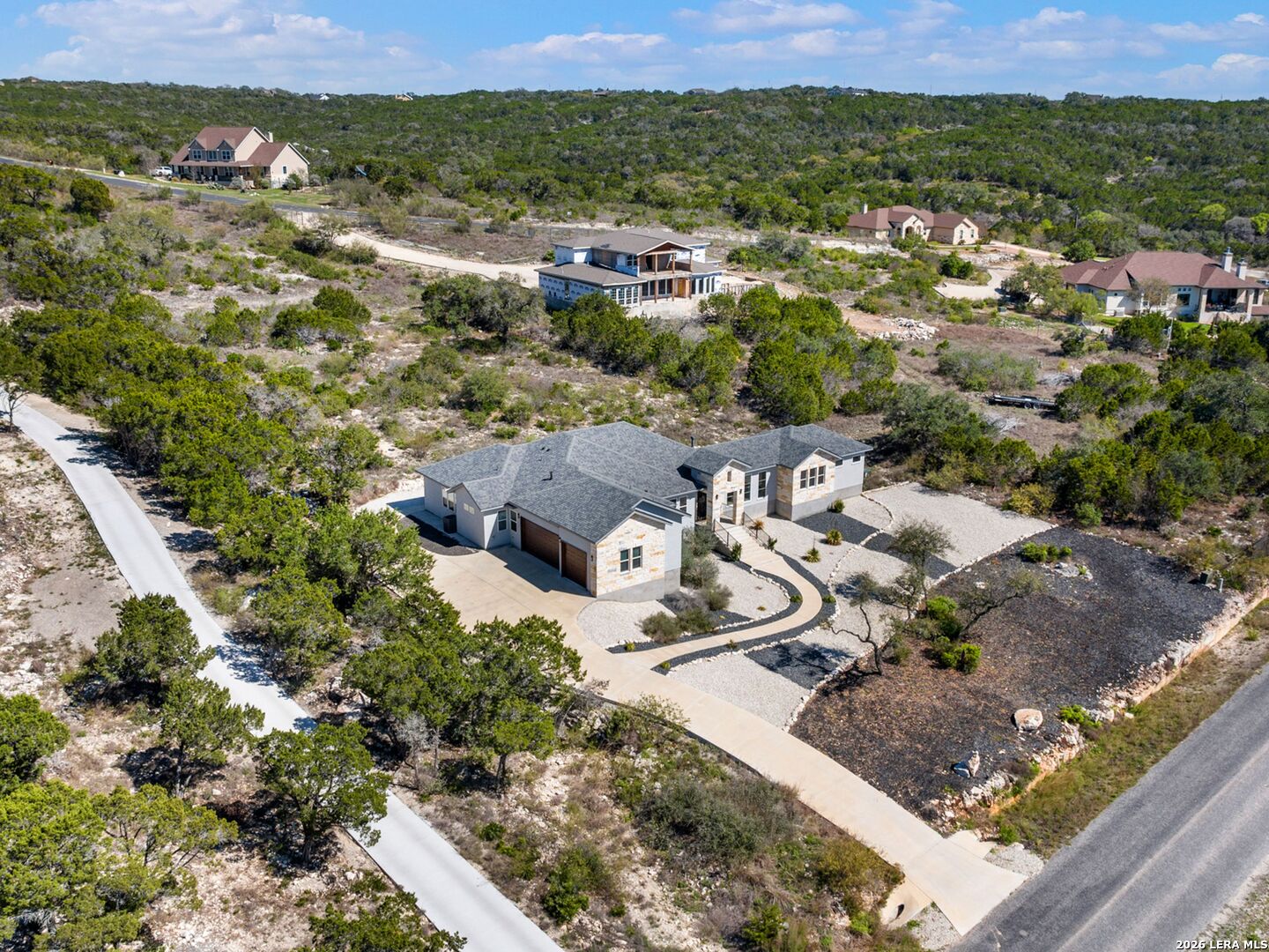 250 Private Road 2775 Mico, TX 78056 - Photo 53 of 57 an aerial view of multiple house