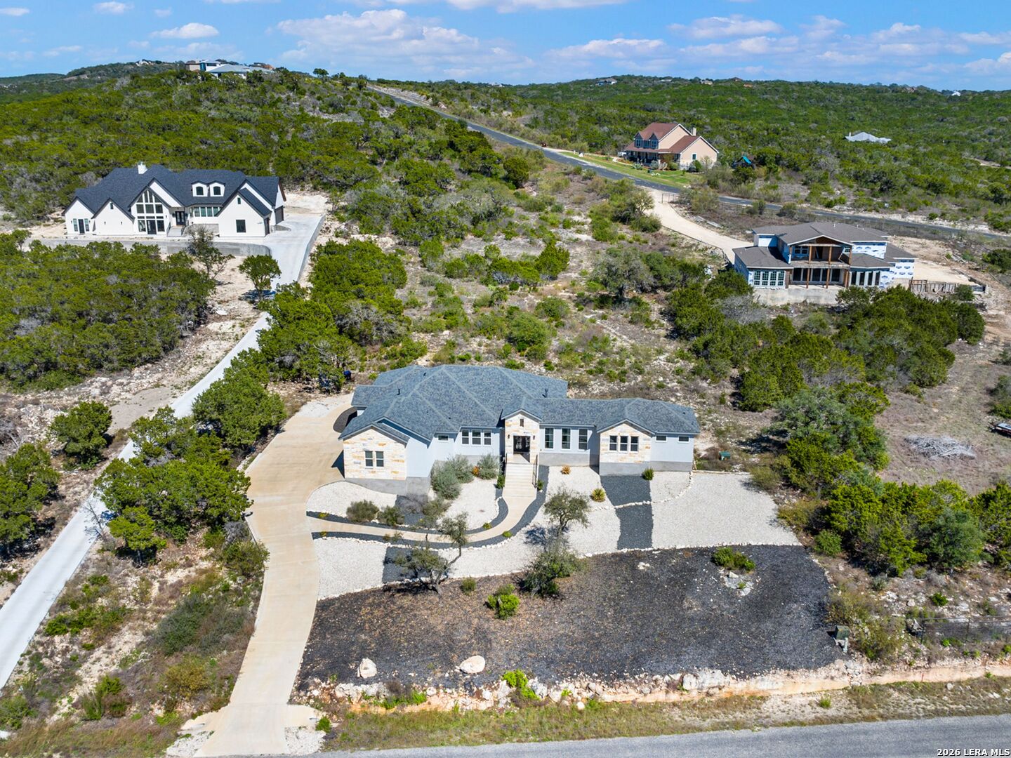 250 Private Road 2775 Mico, TX 78056 - Photo 54 of 57 an aerial view of a house with a yard