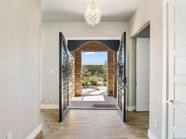 a view of an empty room and fire place