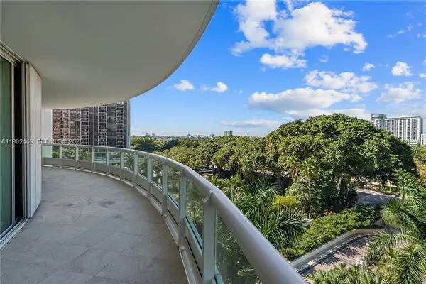 a view of a balcony with an outdoor space