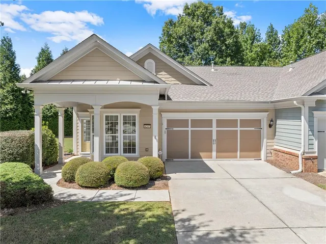 a house view with a garden space