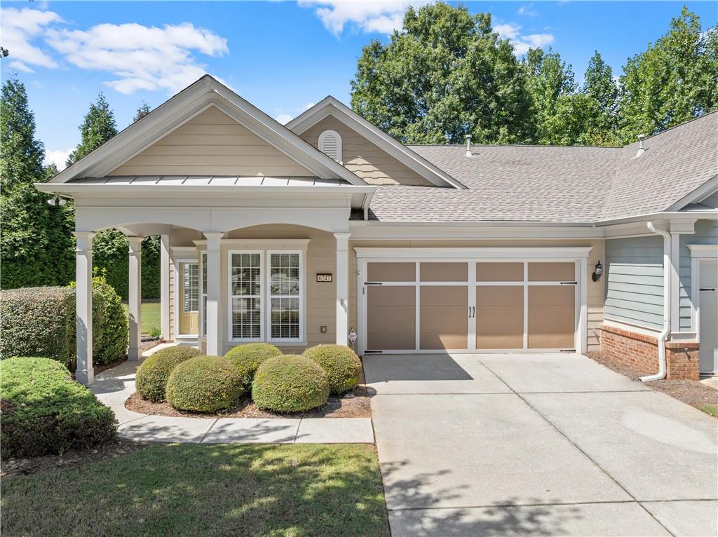 a house view with a garden space