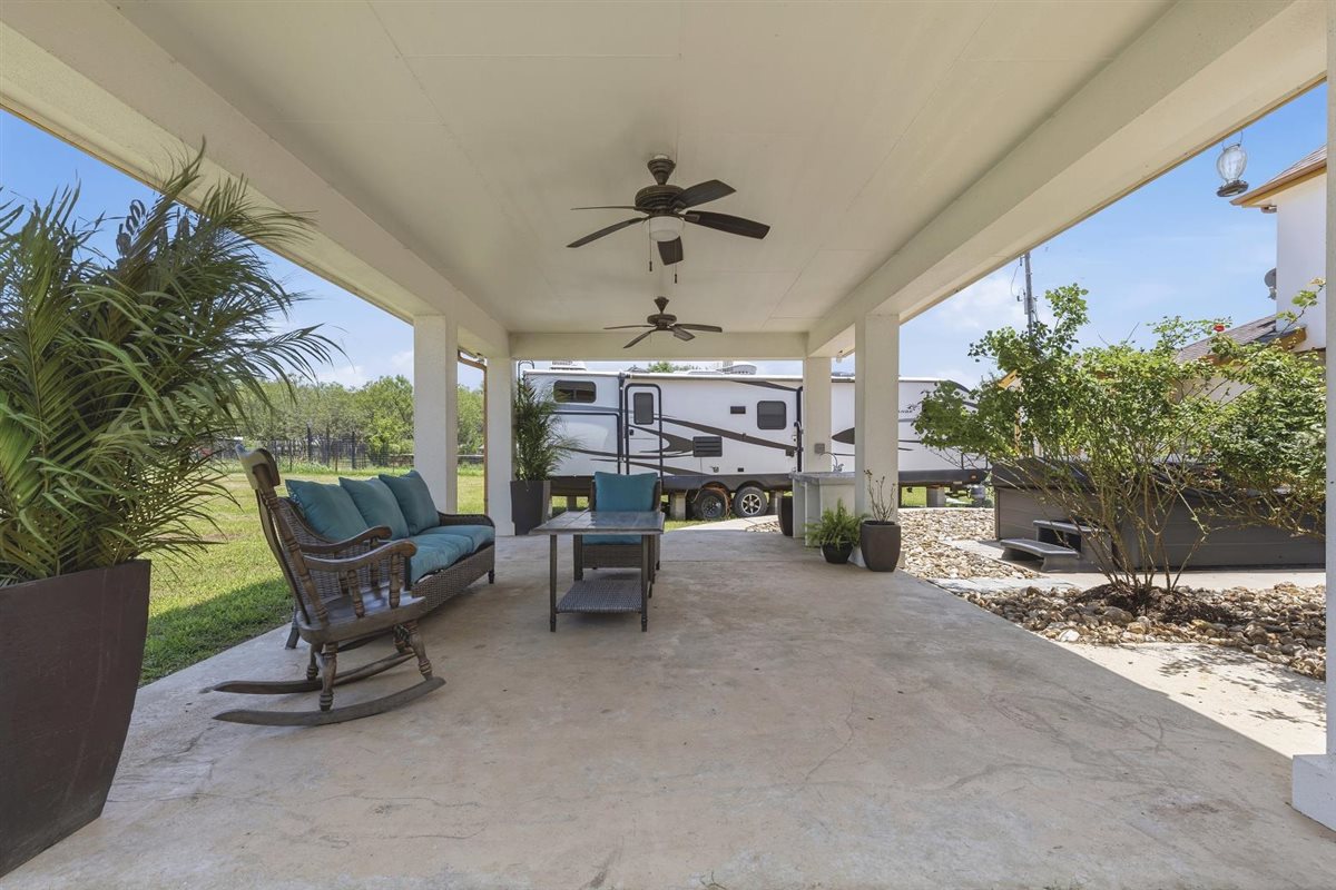 1206 Walter Hoffman Road Cedar Creek, TX 78612 - Photo 33 of 40 Covered back patio perfect for entertaining and relaxing.