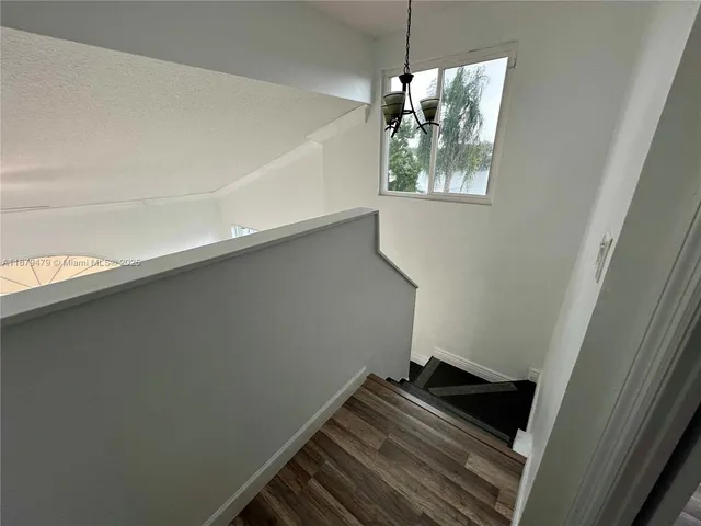a bathroom with a double vanity sink and mirror