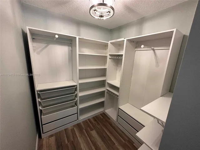 wooden floor and staircase in a bathroom