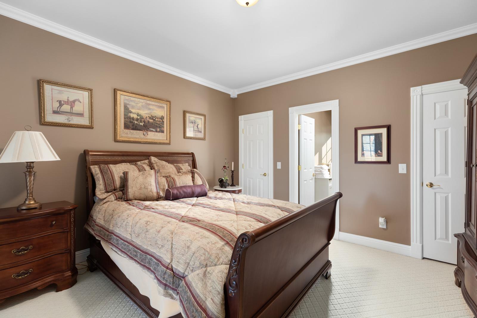 4304 Clarence Murphy Road Springfield, TN 37172 - Photo 14 of 30 a bedroom with a bed and a lamp on table