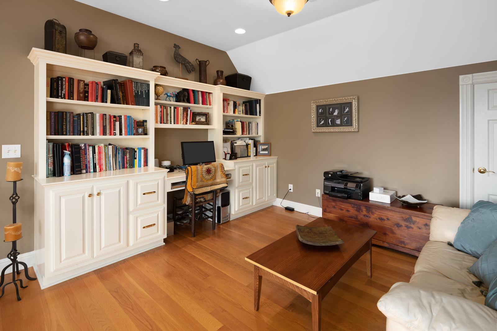 4304 Clarence Murphy Road Springfield, TN 37172 - Photo 15 of 30 a living room with furniture cabinets and a book shelf