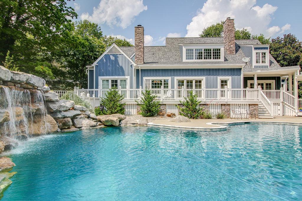 4304 Clarence Murphy Road Springfield, TN 37172 - Photo 18 of 30 a front view of a house with swimming pool having outdoor seating