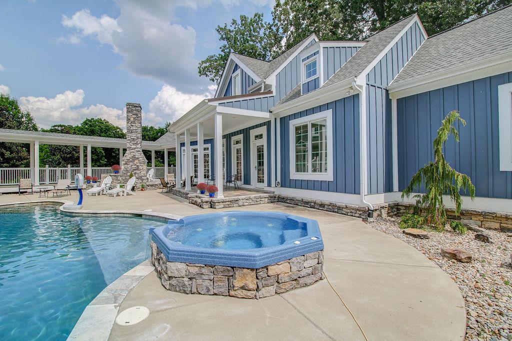 4304 Clarence Murphy Road Springfield, TN 37172 - Photo 19 of 30 a view of a house with backyard fountain and sitting area