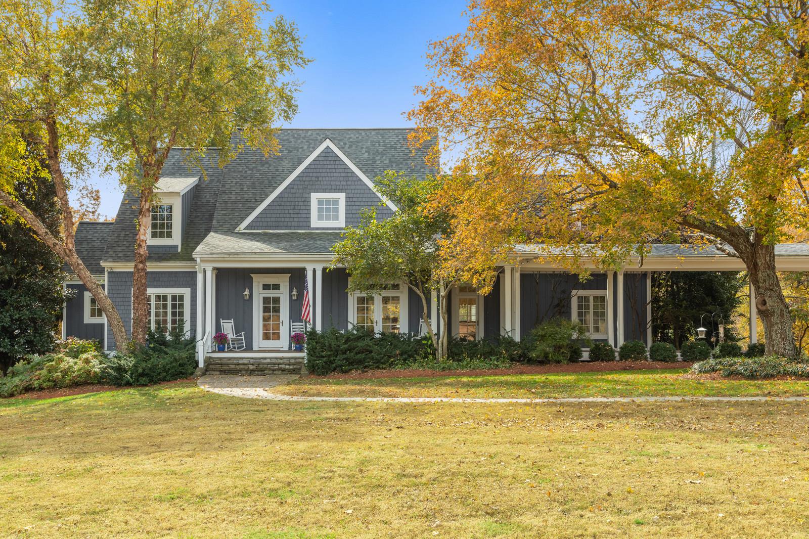 4304 Clarence Murphy Road Springfield, TN 37172 - Photo 2 of 30 a front view of a house with swimming pool and outdoor seating