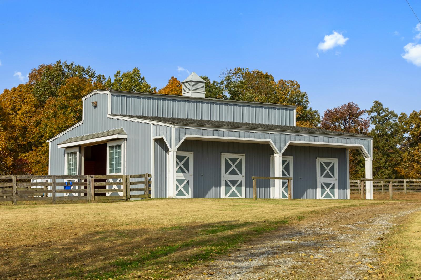 4304 Clarence Murphy Road Springfield, TN 37172 - Photo 5 of 30 a front view of a house with yard patio and fire pit