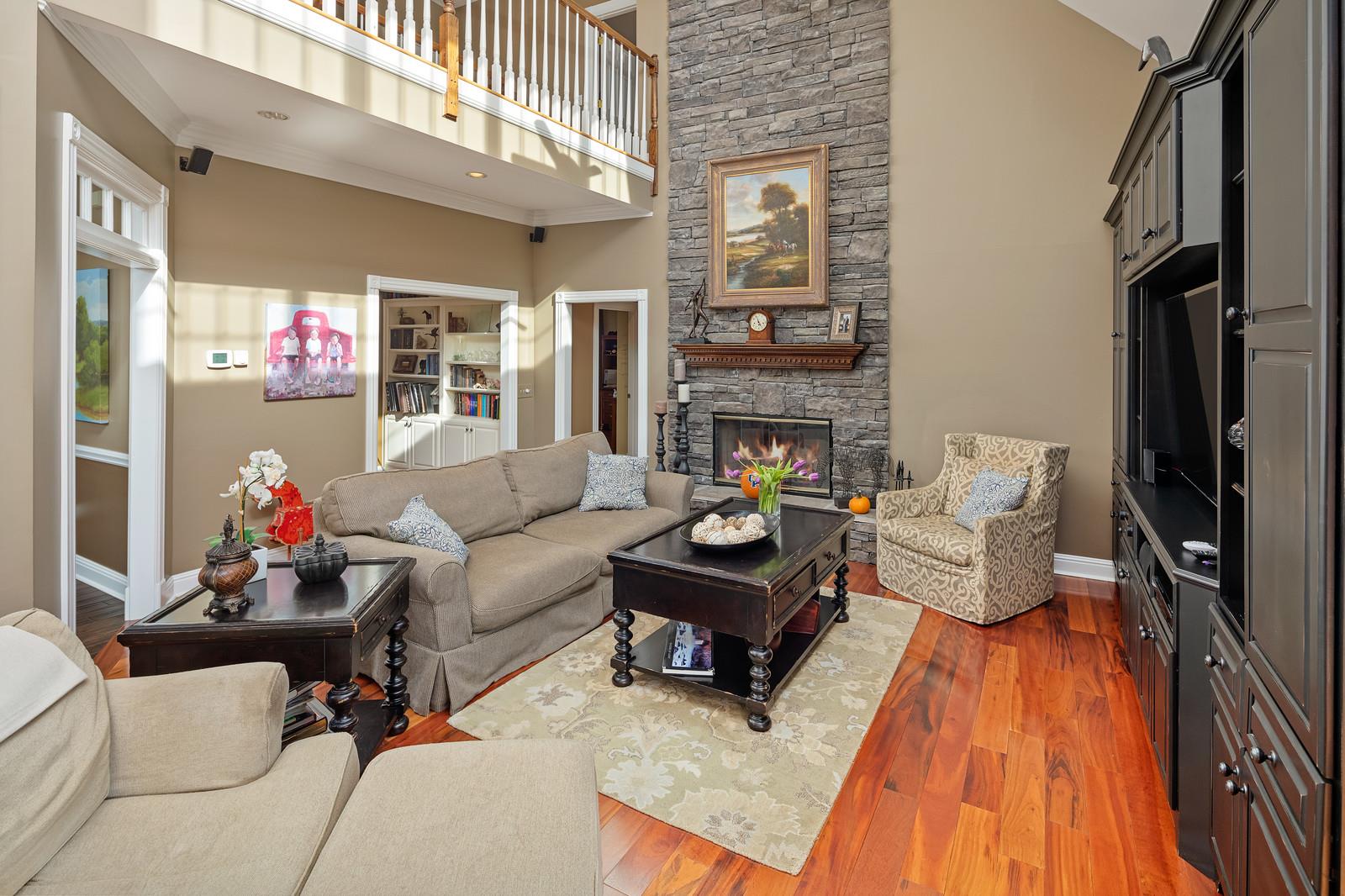 4304 Clarence Murphy Road Springfield, TN 37172 - Photo 9 of 30 a living room with furniture and a fireplace