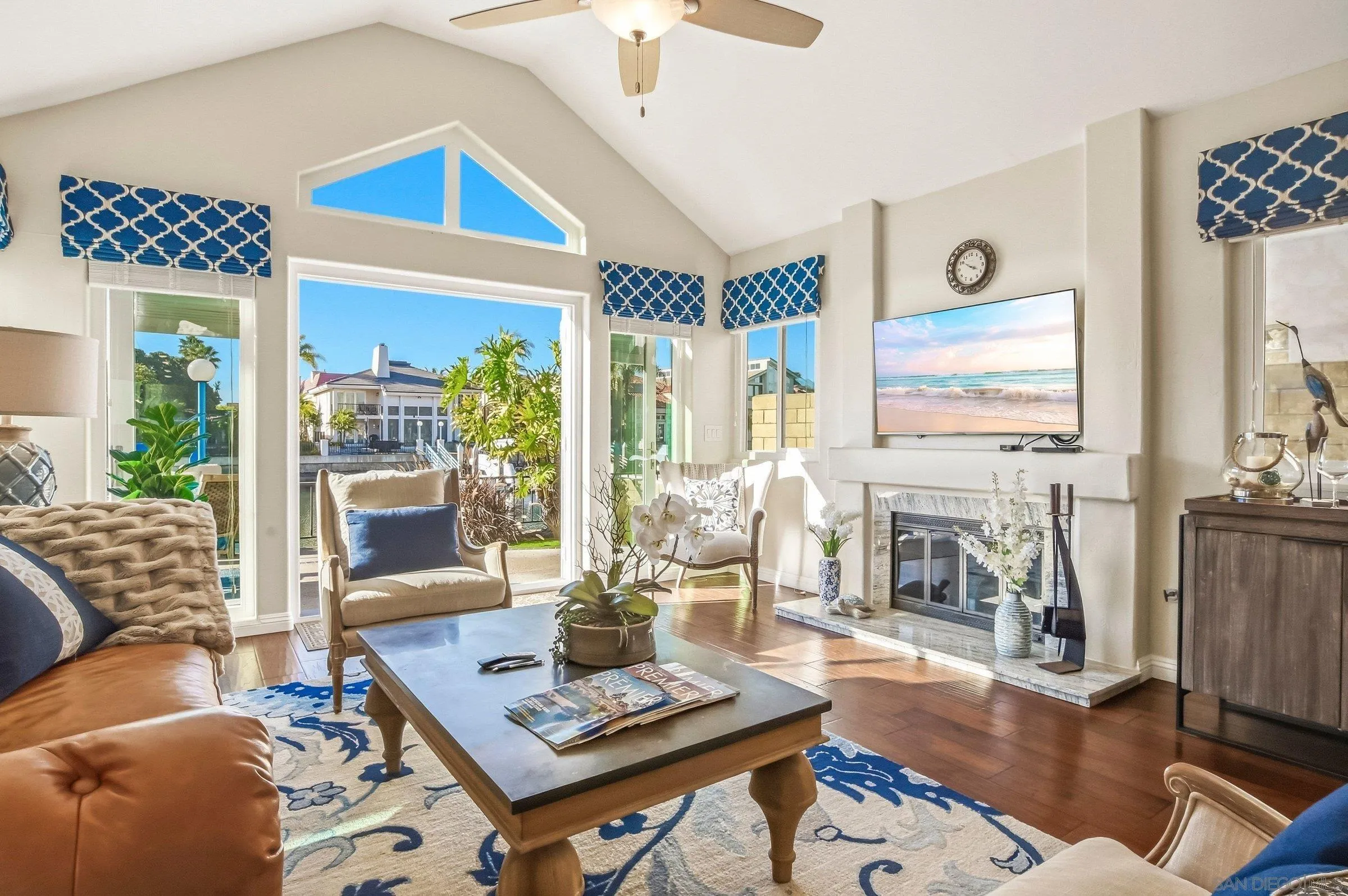 52 Spinnaker Way Coronado, CA 92118 - Photo 12 of 45 a living room with furniture and a fireplace