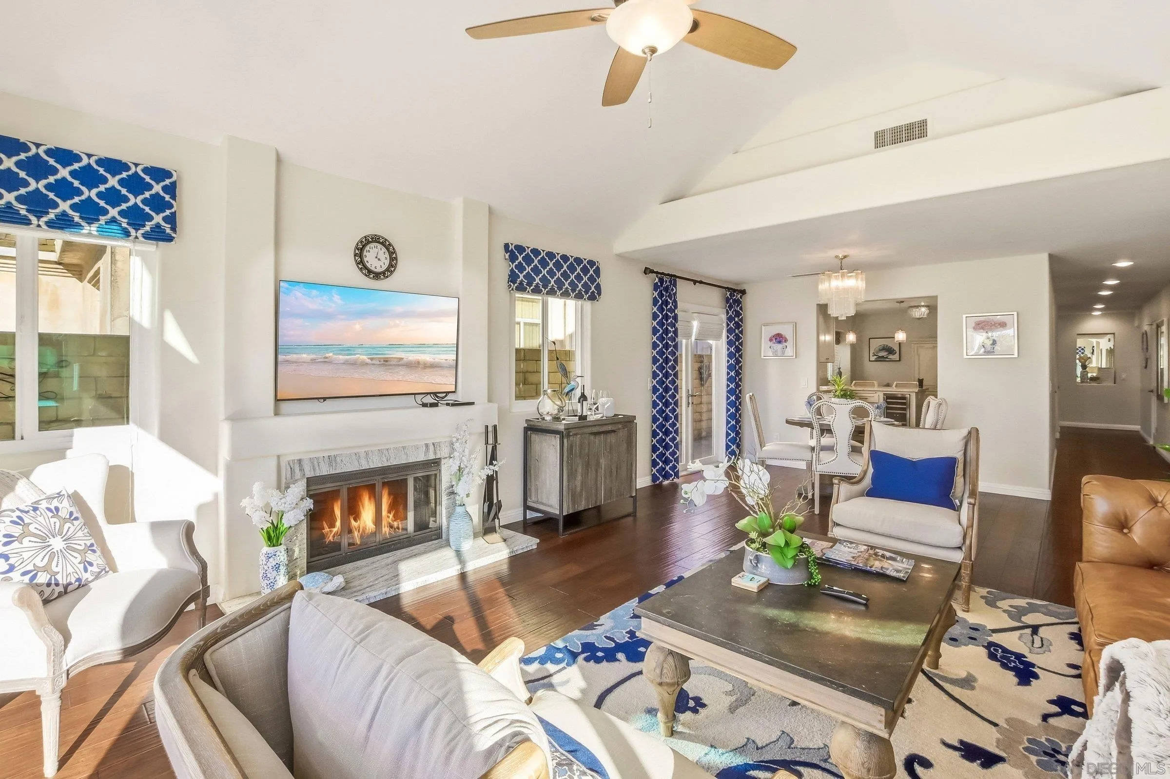 52 Spinnaker Way Coronado, CA 92118 - Photo 13 of 45 a living room with furniture and a fireplace