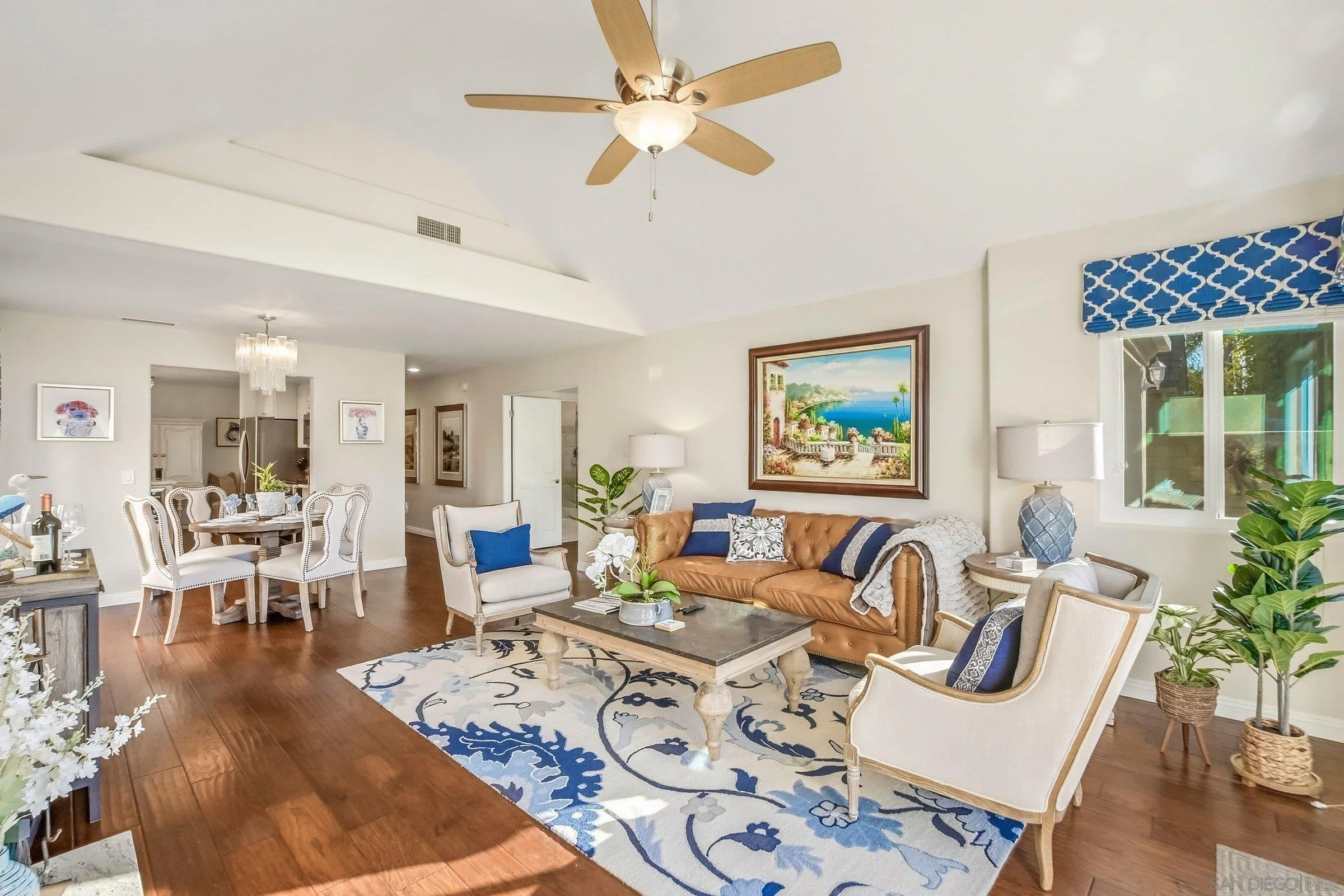52 Spinnaker Way Coronado, CA 92118 - Photo 14 of 45 a living room with furniture wooden floor and a table