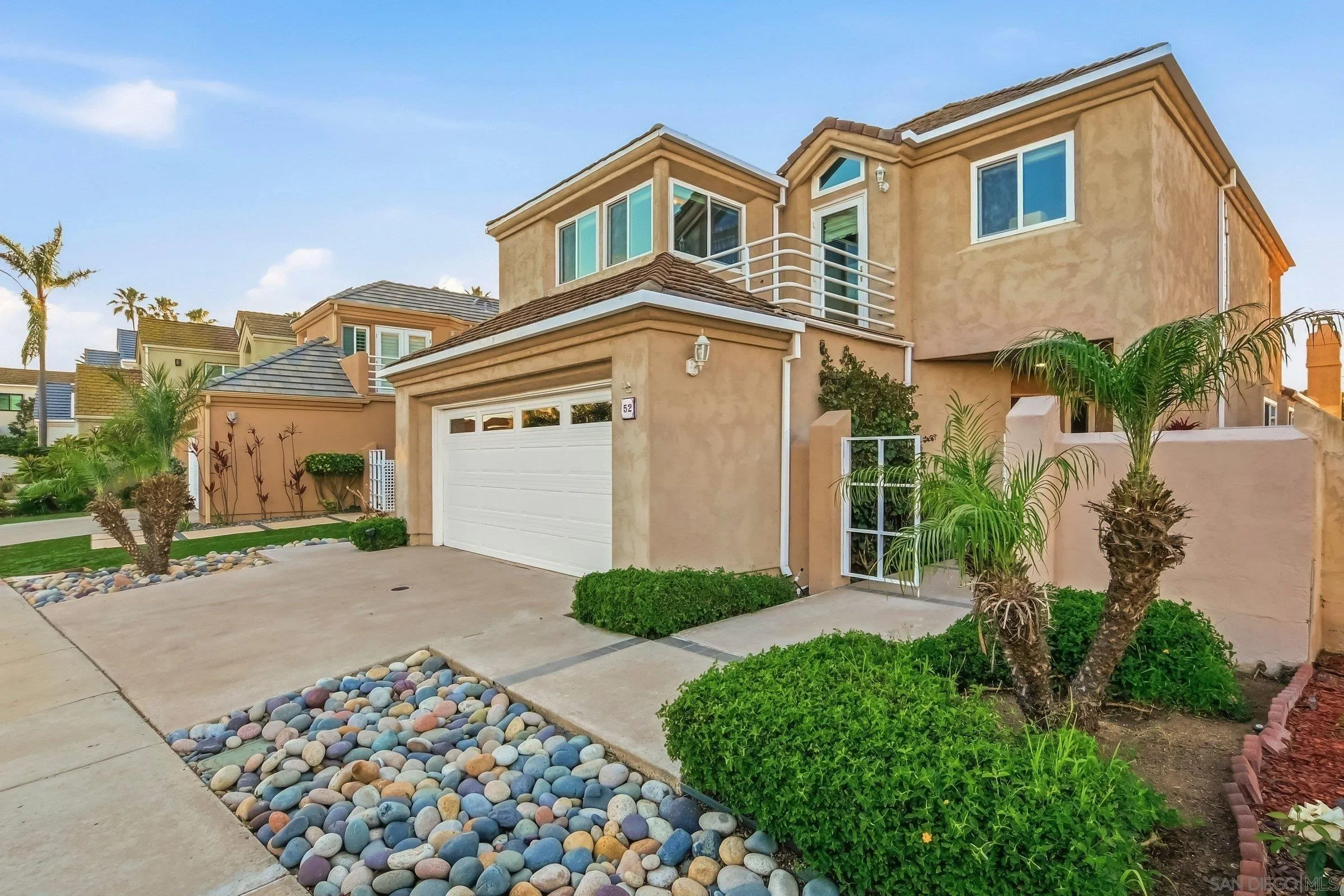 52 Spinnaker Way Coronado, CA 92118 - Photo 2 of 45 front view of a house with a yard