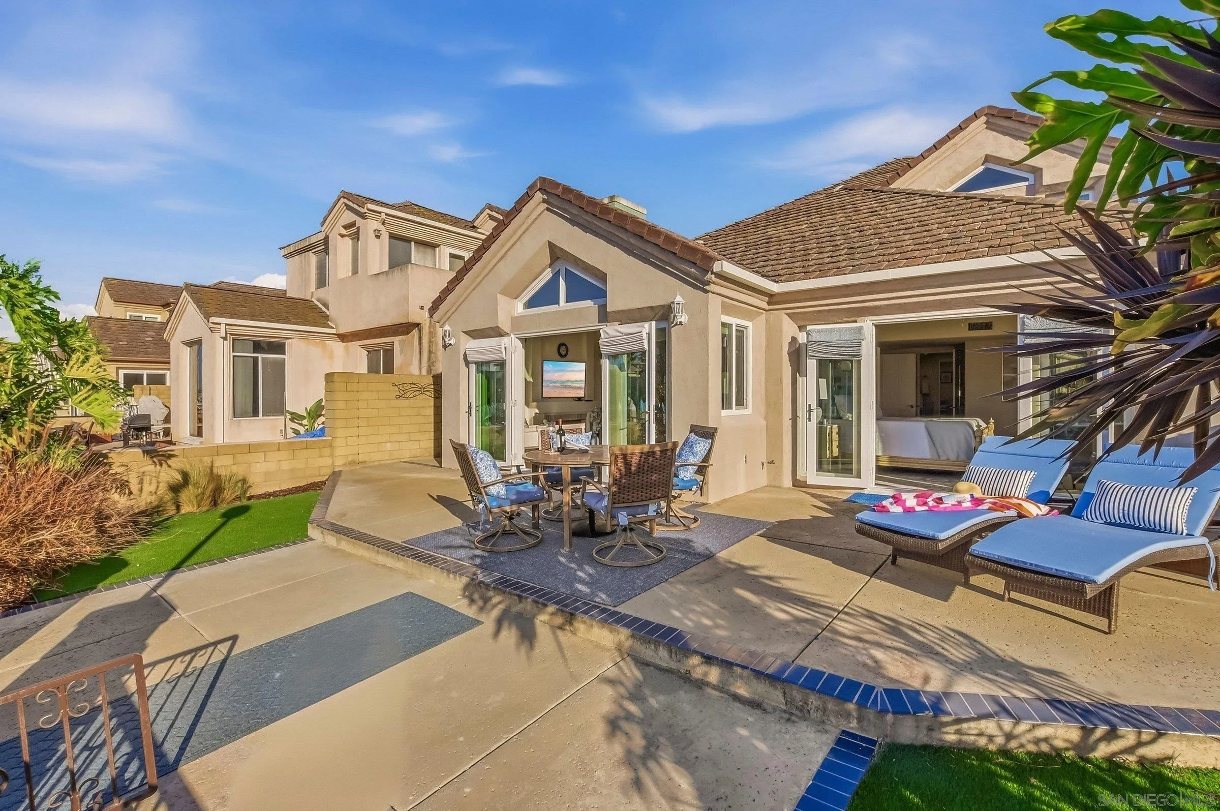 52 Spinnaker Way Coronado, CA 92118 - Photo 31 of 45 a front view of house with yard outdoor seating and green space