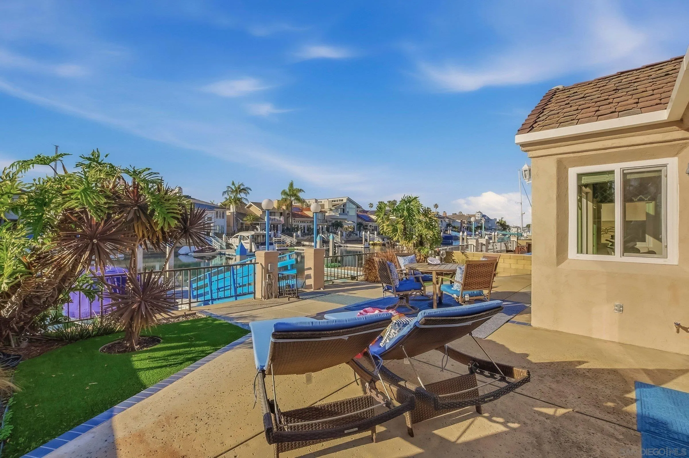 52 Spinnaker Way Coronado, CA 92118 - Photo 32 of 45 a view of a patio with table and chairs and potted plants