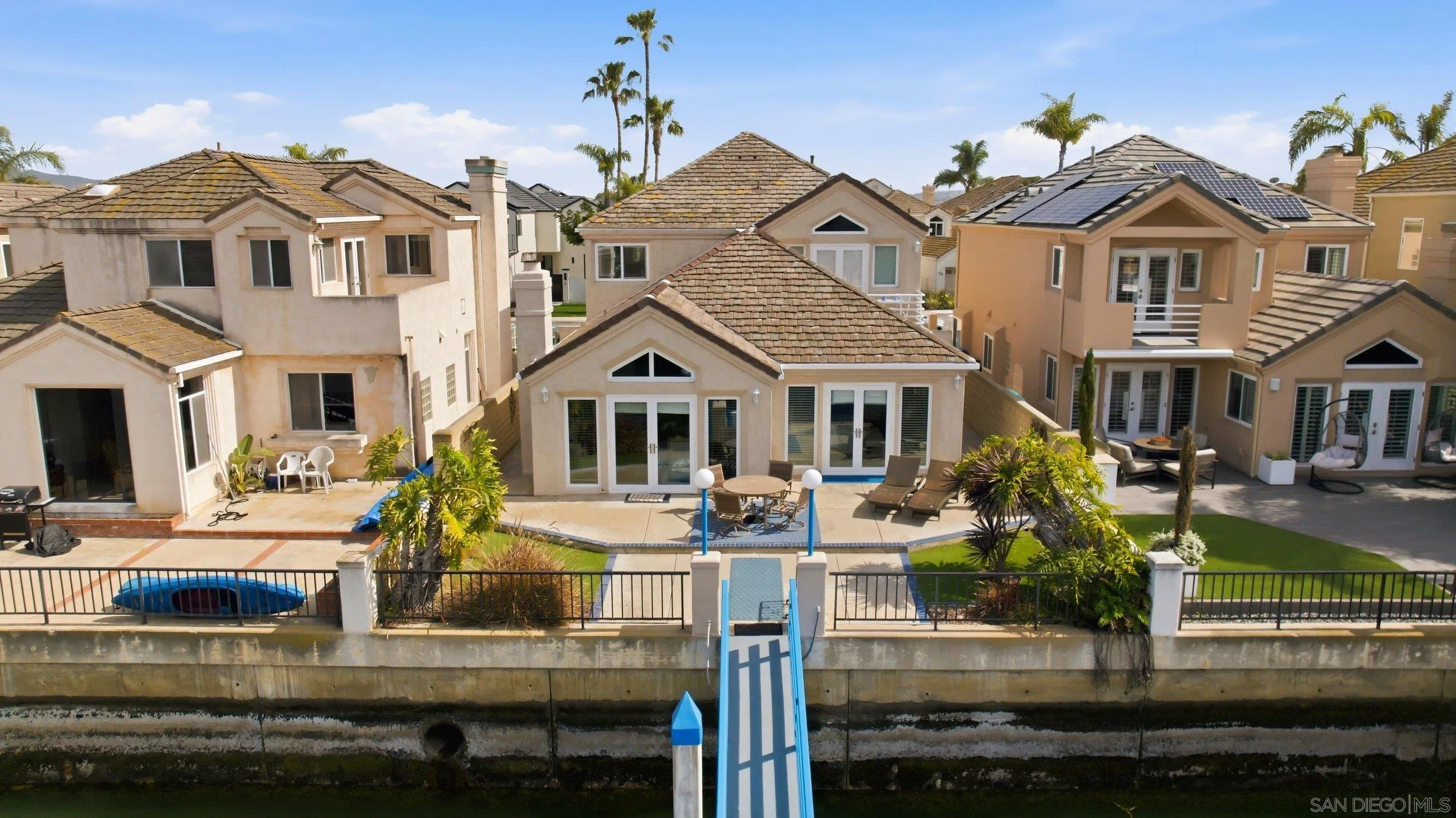 52 Spinnaker Way Coronado, CA 92118 - Photo 42 of 45 a front view of houses with yard